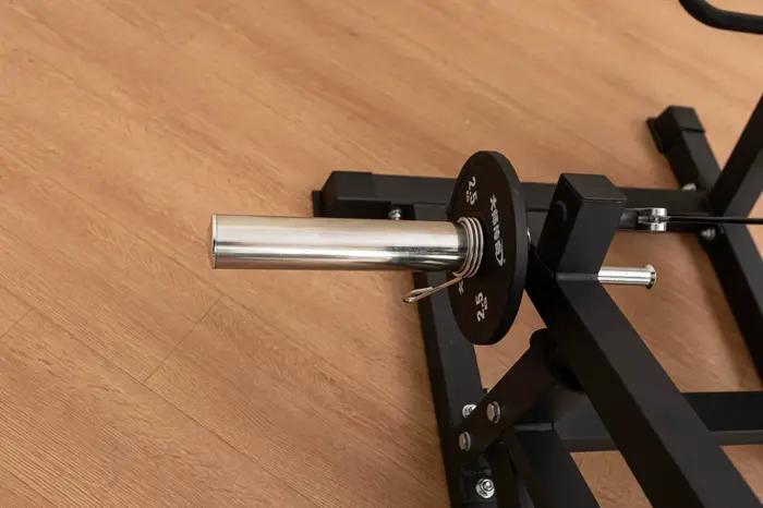 Appareil de musculation combiné pour extensions et curls assis à charge libre