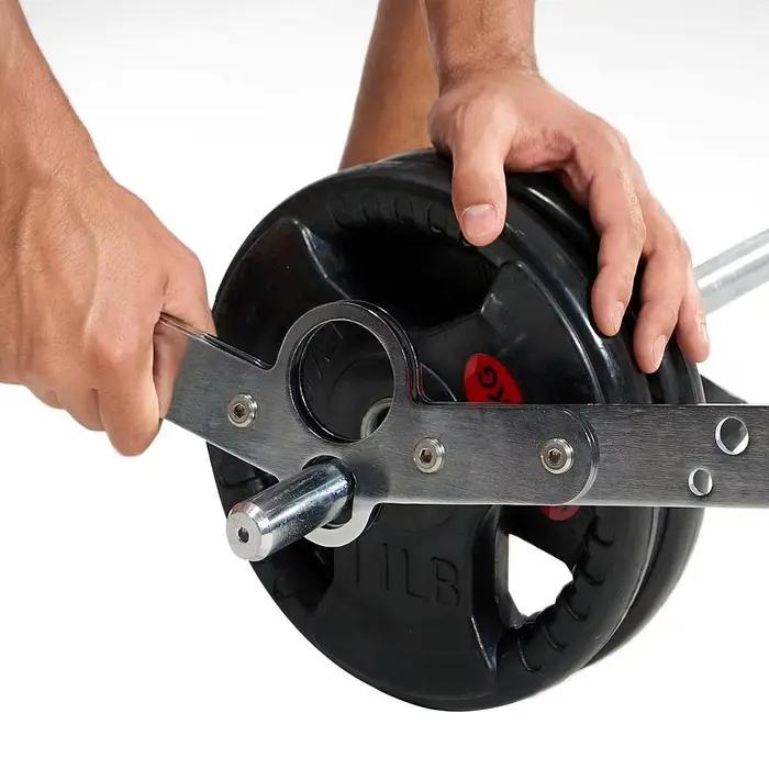 Barre de traction latérale pour machine à câbles en acier