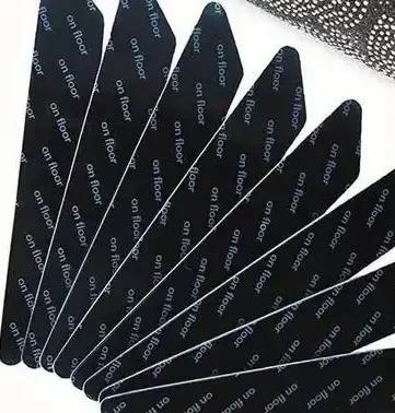 Autocollant antidérapant pour tapis