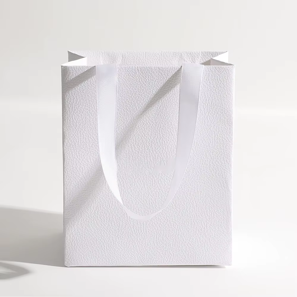 Logo personnalisé 12.5 × 15 × 7.5 cm sac d'emballage de bijoux Boutique litchi motif sac à main en p